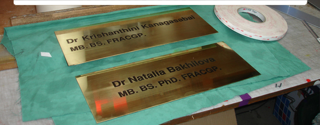 Engraved Brass Plaques with paint fill
